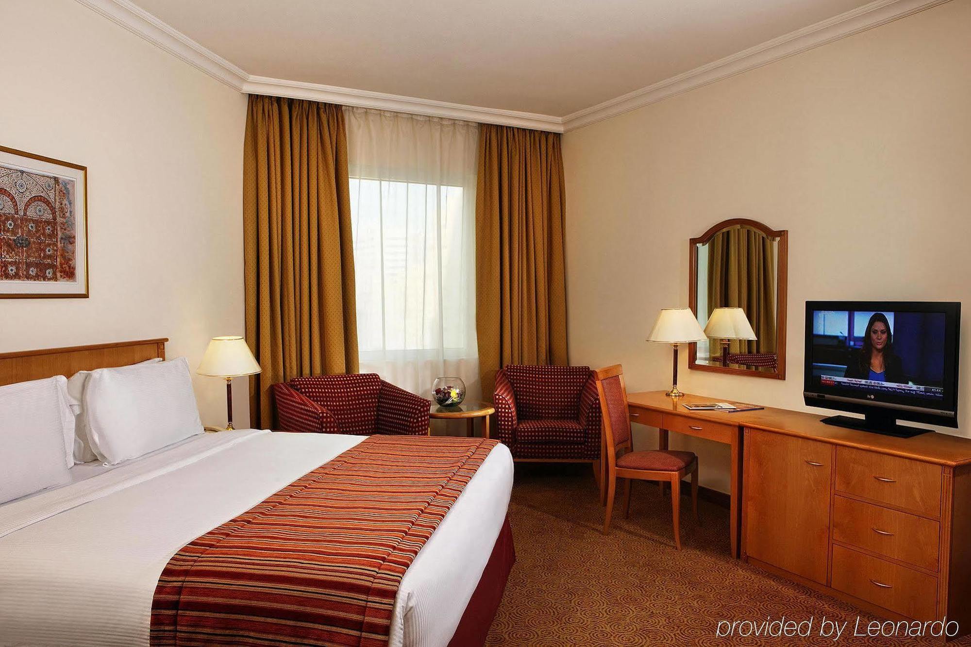 Swiss-Belhotel Sharjah Room photo